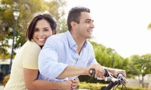 Couple on bike with Fresh Start Program